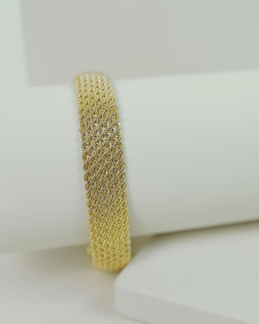 Bracelet femme or maille serpent photographie en composition catalogue
