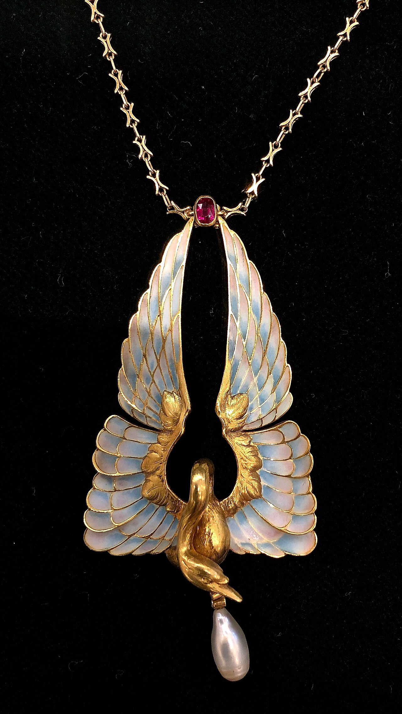 Pendentif rose des vents dore photographie en composition catalogue